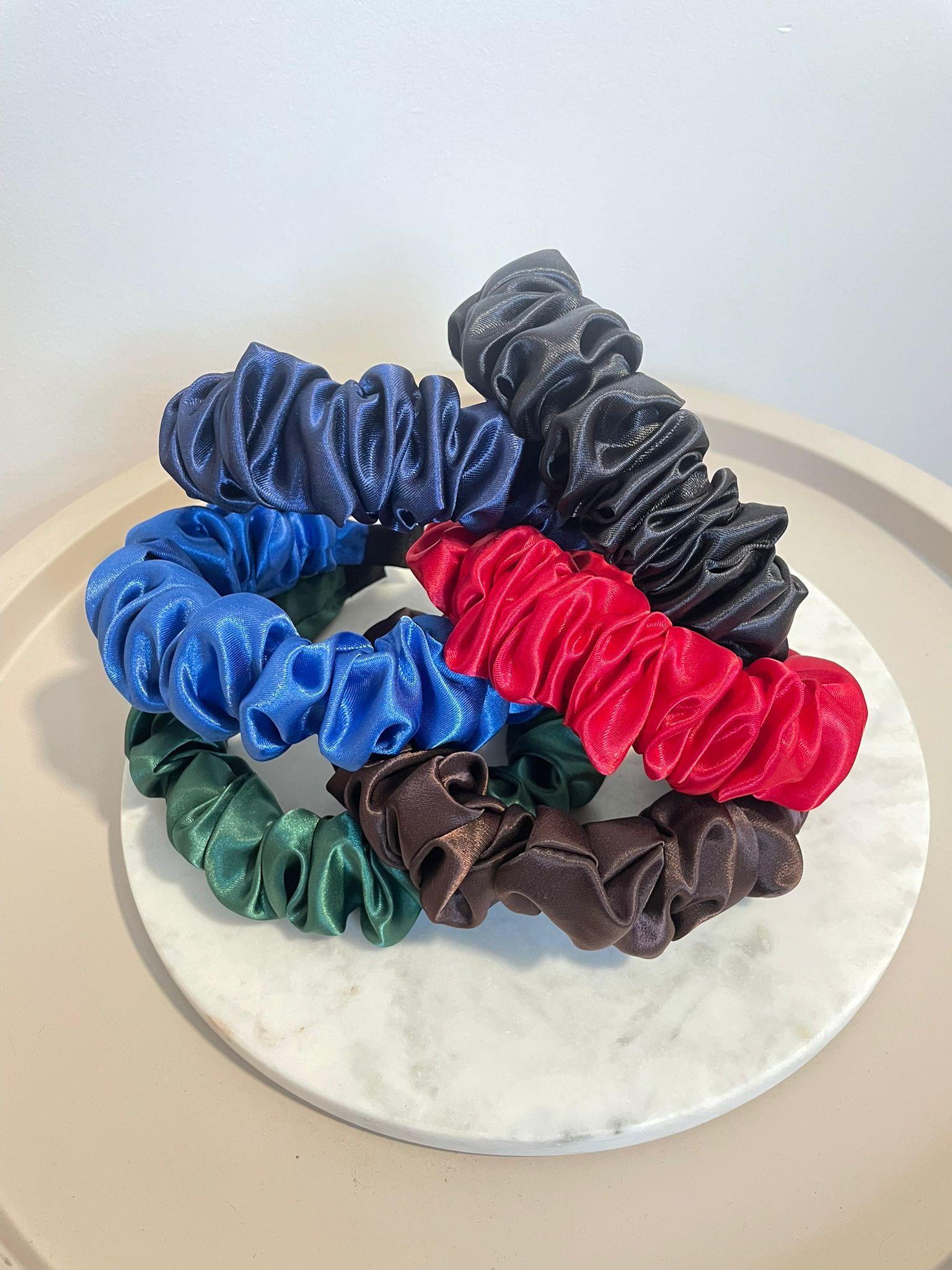 Pile of thick scrunchy headbands